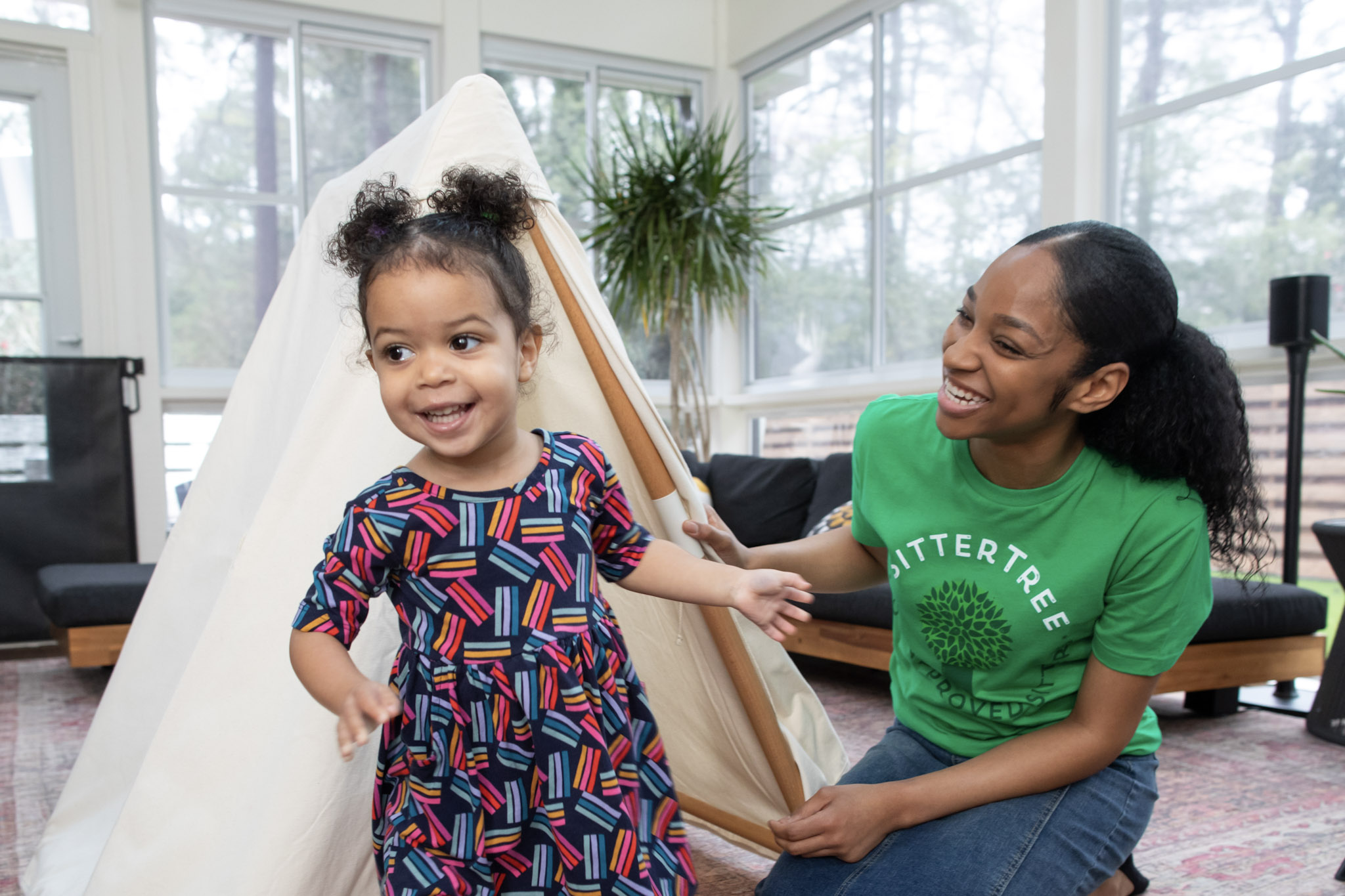 indoor-fort-summertime-activity A sitter and child reduce screentime by building an indoor fort.